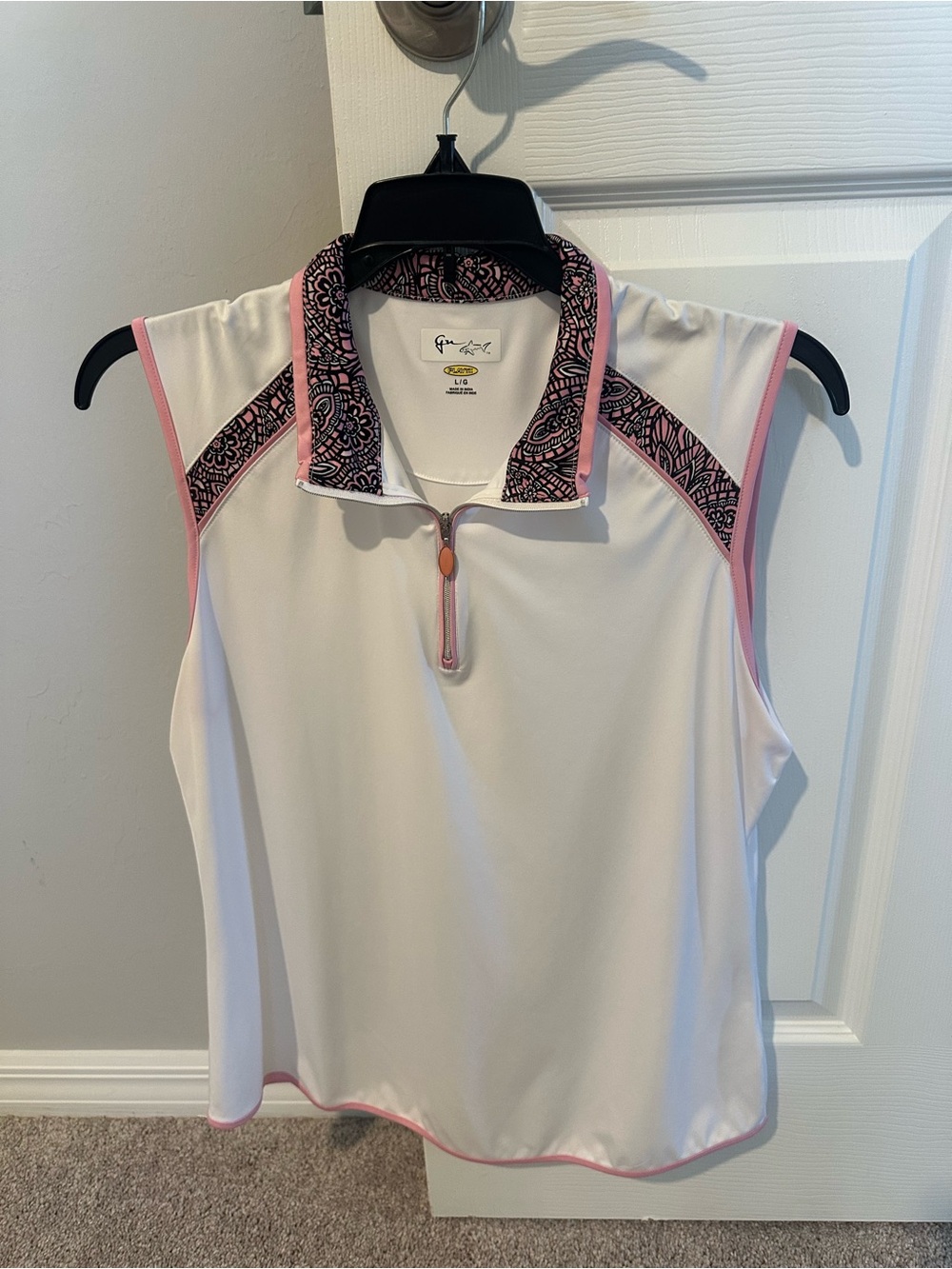 White Sleeveless Polo Top with Pink Trim and Patterned Collar